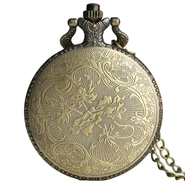 Back view of the vintage bronze poker pocket watch displaying intricate floral engravings on the cover. Elegant and timeless design.