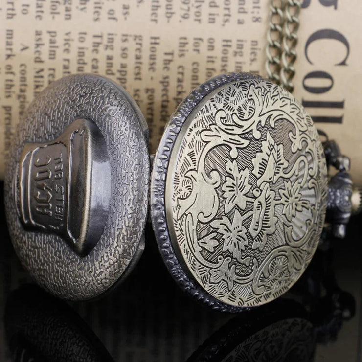 Modern pocket watch with a sleek, black design.