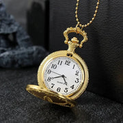 Open-face pocket watch with a visible white dial and Roman numerals.
