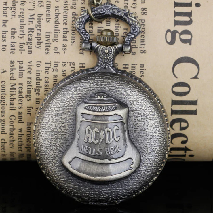 Antique pocket watch with a vintage design and chain.