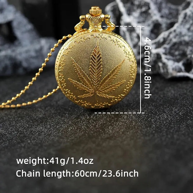 Close-up of a gold pocket watch hanging from a chain, styled with rustic props.