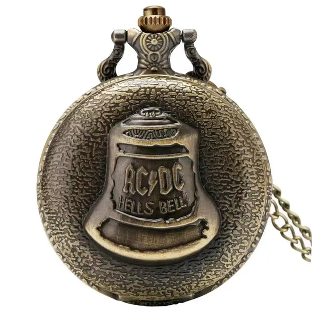 Close-up of a pocket watch with a round case and chain